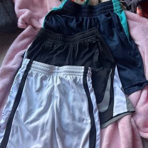 Three cute boy shorts size 1M8 &Two M6 Jordan,Nike Dry fit and Athletic works.